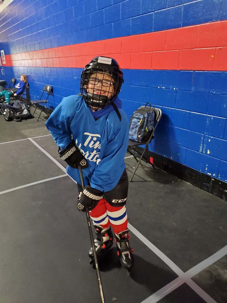 Michael Piasecki playing hockey at Tamo Shanter Youth Hockey with All Kids Play financial assistance youth sports grant