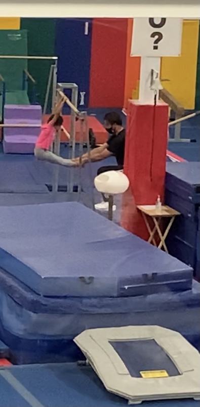 Young female gymnast athlete at gymnastics class with All Kids Play's youth sports financial assistance grant